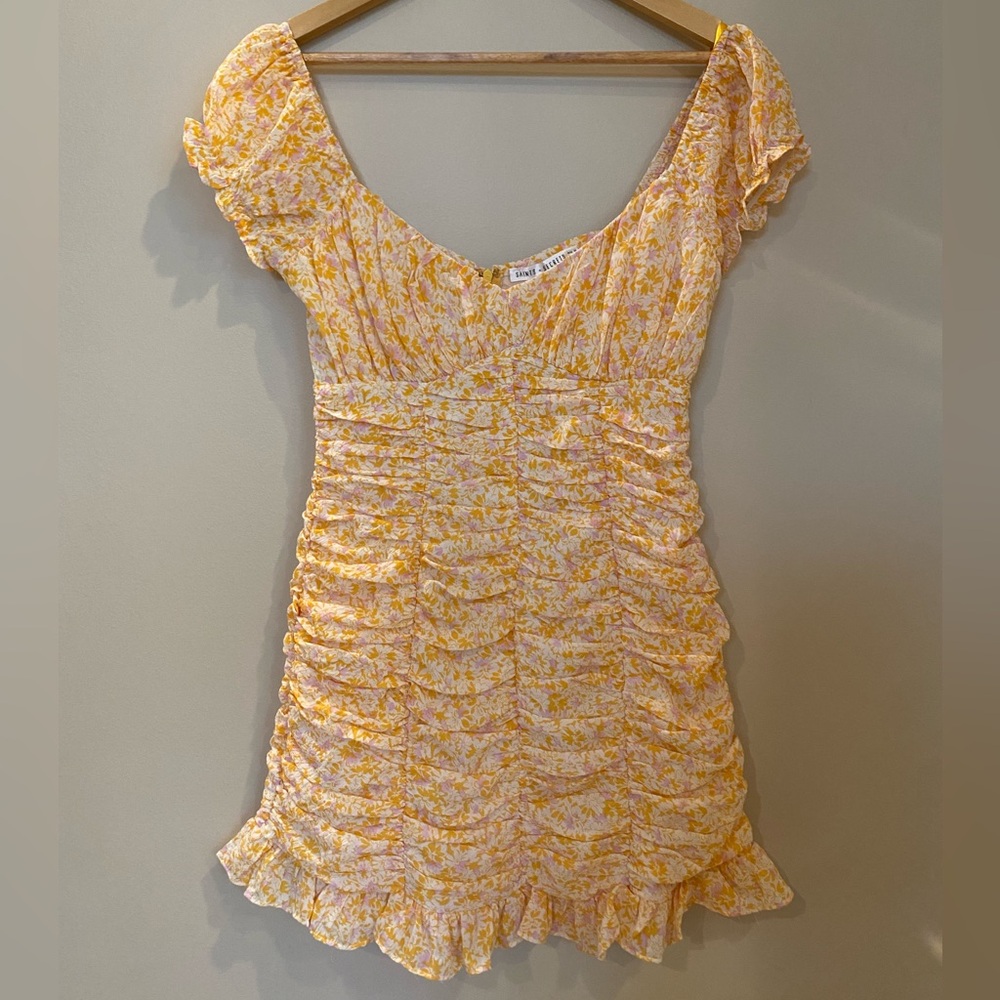 Saints + Secrets ruffle mini dress